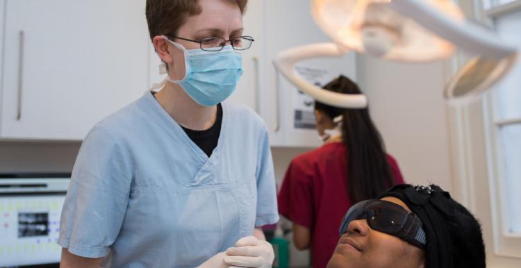 Photo of dentist and patient